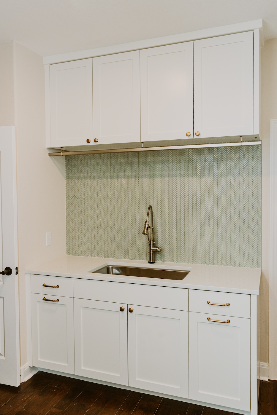 Laundry Room Cabinets and Sink Featuring a Frameless Design and Soft Close Hardware Laundry Room Cabinets and Sink Featuring a Frameless Design and Soft Close Hardware