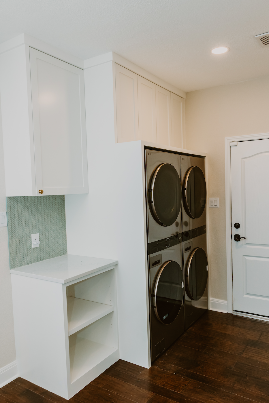 Laundry Room Cabinets Featuring a Frameless Design and Soft Close Hardware Laundry Room Cabinets Featuring a Frameless Design and Soft Close Hardware