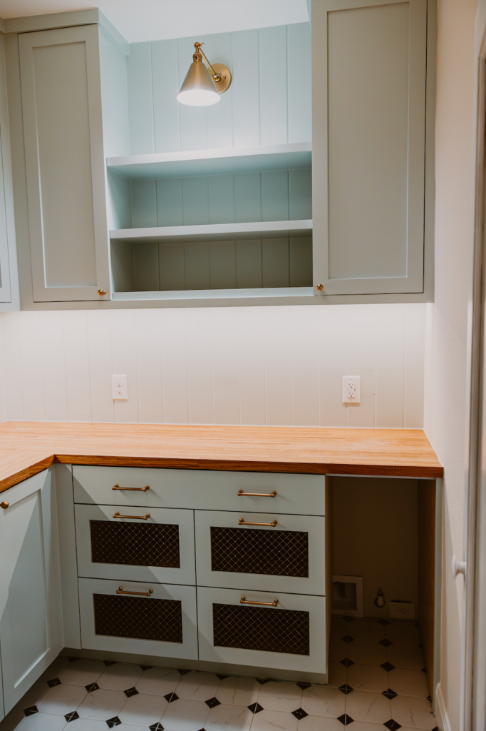 Butler's Pantry Featuring Frameless Cabinets and Vegetable Drawers with Soft Close Hardware in Seasalt