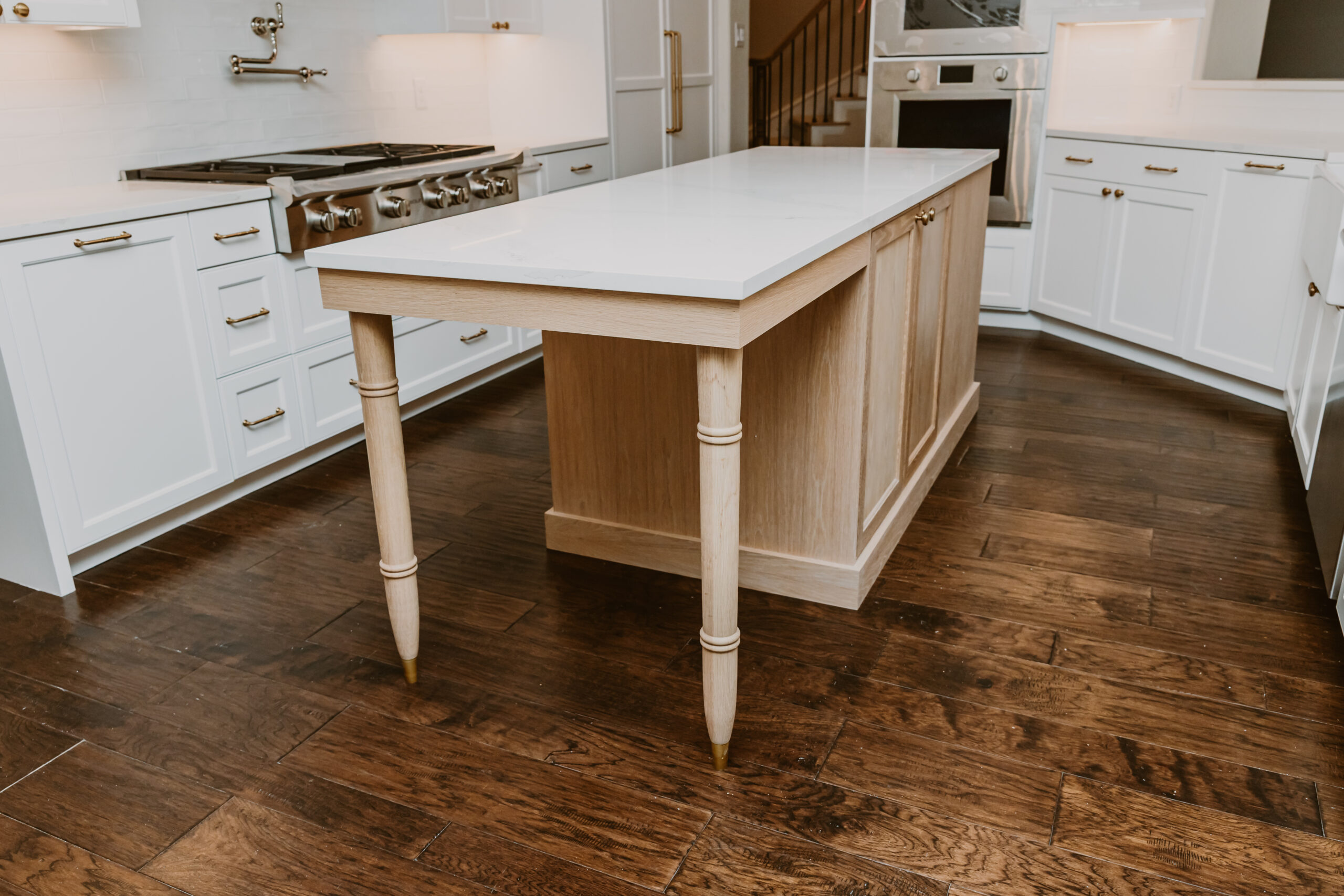 White Oak Kitchen Island Featuring Frameless Cabinets and Soft Close Hardware and Custom Legs White Oak Kitchen Island Featuring Frameless Cabinets and Soft Close Hardware and Custom Legs